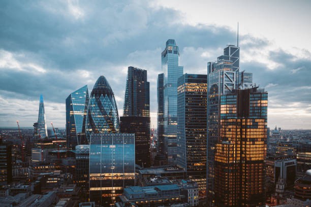 A financial district skyline at dusk